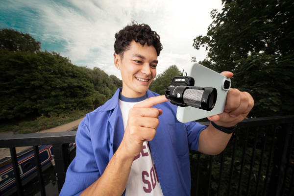 A person pointing at a cameraAI-generated content may be incorrect.